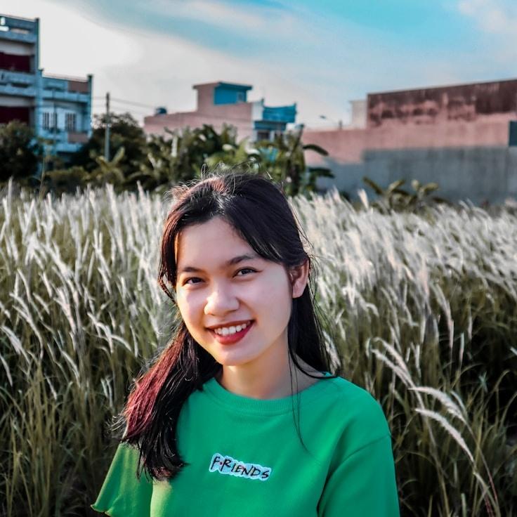 Kaveri Mehta, Lead Design Curator at Global Connect Platform, reviewing corporate floral arrangements